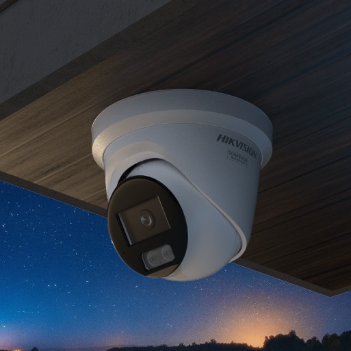 Hikvision dome CCTV camera on a residential home at night